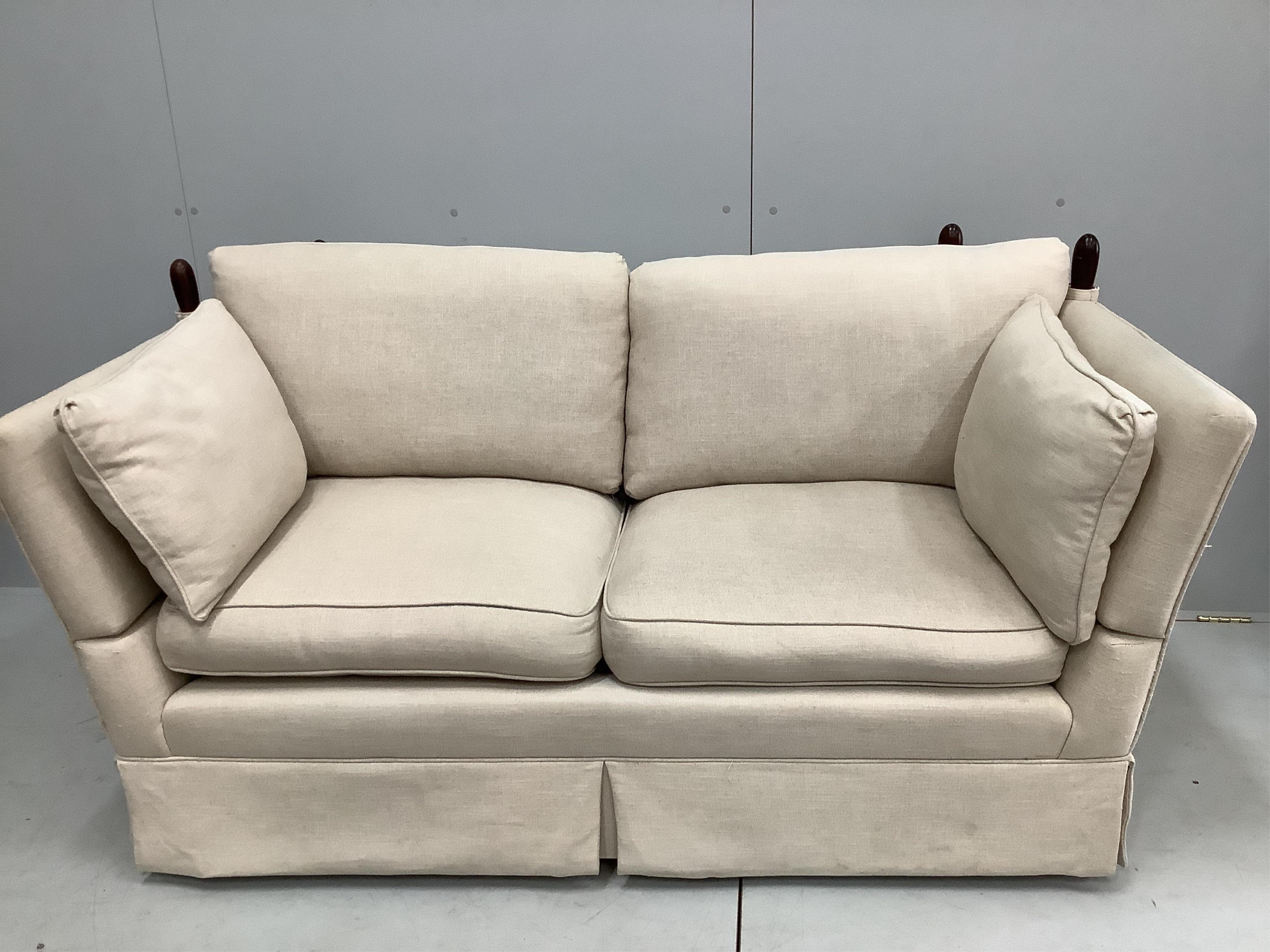 A small Contemporary Knowle settee upholstered in a natural linen fabric, width 170cm, depth 84cm, height 85cm. Condition - good